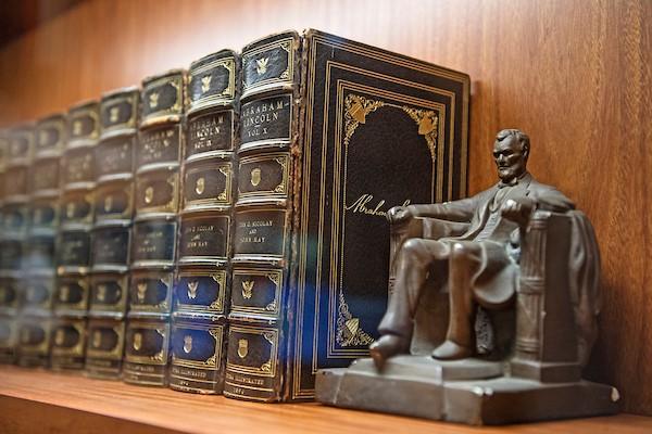 lincoln statue on bookshelf